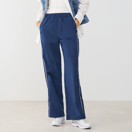 NIKE PANT JOGGER WIDE LEG WVN AZUL MARINO/BLANCO MUJER