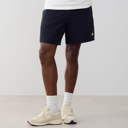 NEW BALANCE SHORT ESSENTIALS SMALL LOGO NEGRO/BLANCO HOMBRE