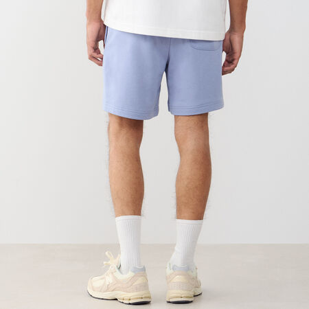 NEW BALANCE SHORT ESSENTIALS SMALL LOGO AZUL/BLANCO HOMBRE