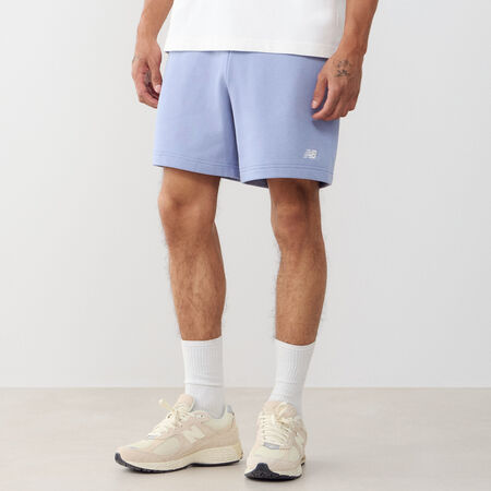 NEW BALANCE SHORT ESSENTIALS SMALL LOGO AZUL/BLANCO HOMBRE