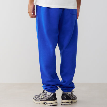 NEW BALANCE PANT JOGGER SMALL LOGO AZUL/BLANCO HOMBRE