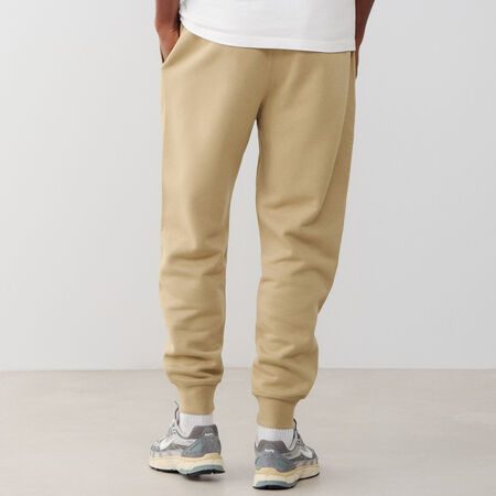 NIKE PANT JOGGER CLUB BEIGE/BLANCO HOMBRE