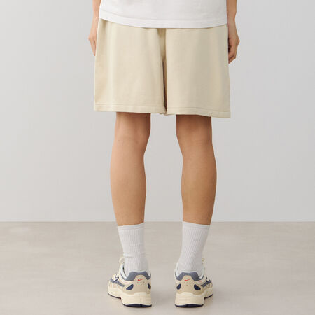 NIKE SHORT CLUB FLOW BEIGE/BLANCO HOMBRE