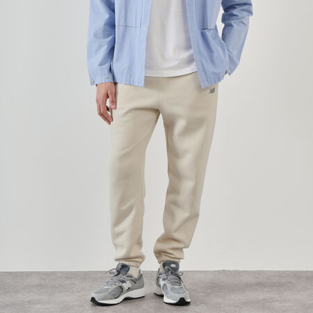 NEW BALANCE PANT JOGGER SMALL LOGO BEIGE HOMBRE